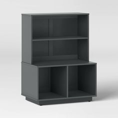 a gray bookcase with three shelves on each side