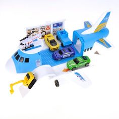 a toy airplane with cars on the tarmac