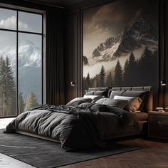 a large bed sitting in front of a window next to a wall with mountains on it