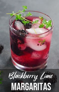 blackberry lime margarita with ice and mint garnish