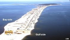 an aerial view of the bay side and gulfside