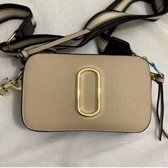 Colorblock Snapshot Fashion Crossbody Bag White/Tan/Forest Green Gold Accents And Zipper Nwot Never Carried, Will Ship With Dust Bag. Beige Square Bag With Branded Hardware, Square Beige Bag With Branded Hardware, Beige Rectangular Bag Strap With Gold-tone Hardware, Beige Crossbody Camera Bag With Detachable Strap, Trendy Beige Bag With Branded Hardware, Beige Camera Bag With Adjustable Strap For Daily Use, Daily Use Beige Camera Bag With Adjustable Strap, Cream Crossbody Box Bag With Adjustable Strap, Trendy Rectangular Camera Bag With Adjustable Strap