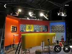 a television studio set with lights and lighting equipment