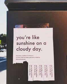 a piece of paper that has been placed on a parking meter with the words you're like sunshine on a cloudy day