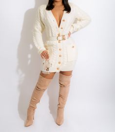 Slip into the Pretty In Pearls Sweater Mini Dress Ivory and experience the definition of sophisticated femininity. This stylish design is crafted from a sumptuous knit fabric and features long sleeves with a flirtatious V-neckline, pearl-embellished accents, and a waist-cinching belt for a flattering fit. Offering an elegant balance between day and night, this refined piece is perfect for both occasions. Pair with a mini bag fabulous thigh high boots or heels for a knock out look. Model wearing White Long Sleeve Sweater Dress For Winter, White Long Sleeve Sweater Dress For Fall, Cream Knit Long Sleeve Sweater Dress, Cream Long Sleeve Knit Sweater Dress, Long Sleeve Cream Knit Sweater Dress, White Fitted Sweater Dress For Fall, Fitted White Sweater Dress For Fall, Cream Fitted V-neck Sweater Dress, Winter White Long Sleeve Sweater Dress