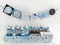 a baby shower party with blue and white decorations