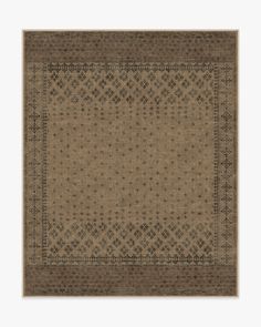 an area rug with brown and black designs on the bottom, in front of a white background