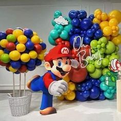 an image of mario birthday decoration with balloons