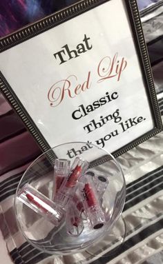 there is a sign on the table that says red lip classic thing that you like