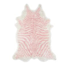 a pink and white animal print rug