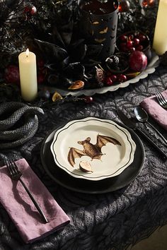 Set your Halloween table with this intricately decorated stoneware plate, each one hand-finished especially for terrain. | Halloween Stoneware Plate in Black at Terrain Terrain Halloween, Cast Iron Decor, Halloween Trends, Halloween Tablescape, Organic Ceramics, Spooky Szn, Halloween Dinner, Organic Decor, Glass Pumpkins