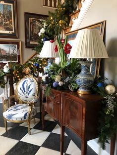 christmas decorations are on display in the entryway