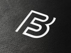 the letter b is made up of white letters on a black background with a shadow