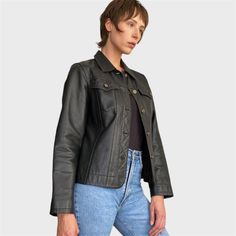 This 90s vintage black leather jacket is a timeless piece that exudes retro style and sophistication. Crafted from high-quality leather, this jacket features a classic button closure and is designed in a versatile size M/L. With its sleek silhouette and timeless design, this leather blazer is the perfect addition to any wardrobe, adding a touch of edgy elegance to any outfit.  CONDITION: Great Vintage Condition FABRIC: genuine leather SIZE: UK 12/L, EU 40/L , will fit other sizes depending on de Classic Black Leather Jacket With Button Closure, Fall Biker Leather Jacket With Button Closure, Fall Leather Jacket With Snap Buttons, Classic Leather Jacket With Button Closure, Classic Button-up Leather Jacket With Pockets, Classic Leather Jacket With Buttons, Leather Biker Outerwear With Buttons, Classic Leather Jacket With Snap Buttons For Work, Classic Long Sleeve Leather Jacket With Buttons