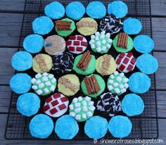 cupcakes are arranged on a cooling rack