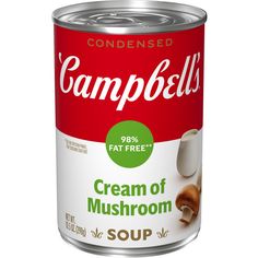 a can of cream of mushroom soup with the word campbell's written on it