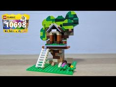 a lego tree house with a ladder to the roof and a sign above it that says classic 1068