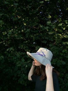 "This 'Anna' hat is one of my best sellers the shape is very flattering and offers really good protection from the sun, while creating a simple elegance in the overall look of the hat. Made from 100% natural linen, with a beautiful detail of three sprigs of hand embroidered lavender. The brim width is 14cm at the front tapering to 10cm at the back to offer freedom of movement, and to help stop the hat catching at the nape of the neck. The brim can be worn with a slight turn up or down, however y Wide Brim Sun Hat For Spring Garden Party, Handmade Wide Brim Sun Hat For Spring, Wide Brim Cotton Cloche Hat For Summer, Handmade Wide Brim Sun Hat For Garden Party, Handmade Adjustable Sun Hat For Garden Party, Bohemian Hats For Spring Outdoor Events, Bohemian Hats For Spring Outdoor Occasions, Bohemian Hats For Spring Outdoor, Bohemian Sun Hat For Spring Outdoor