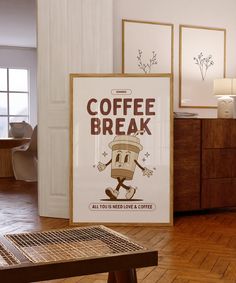 there is a coffee break poster on the floor next to a wooden table and chair