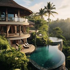 an outdoor pool surrounded by lush green trees