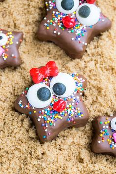 decorated cookies with chocolate and sprinkles in the shape of star shaped animals