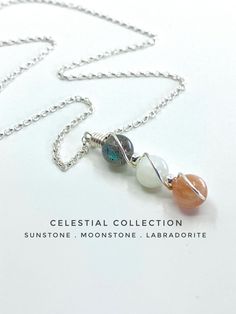 Celestial inspired pendant necklace, featuring genuine natural Sunstone, Moonstone and Labradorite stones. The perfect necklace for anyone who loves the beauty and wonder of the sky, stars and heavens! SUNSTONE  - The stone of happiness, self empowerment and good luck. A blush coloured stone, with an unusual shimmer and warmth. It is formed within lava and once it is released on to the Earths surface, weathering of the lava reveals the crystals hidden within!  MOONSTONE - The stone of inspiration, intuition and new beginnings.  A beautiful white and oyster coloured stone with a moon-like sheen, in certain lights reflects colours of the rainbow. The Romans believed it was created from solidified moon beams. LABRADORITE - The stone of adventure, change and intention, A stunning iridescent gr Celestial Sterling Silver Pendant Crystal Necklace, Celestial Silver Gemstone Crystal Necklaces, Celestial Sterling Silver Necklaces With Natural Stones, Sterling Silver Celestial Pendant Crystal Necklace, Celestial Pendant Necklace With Natural Stones, Celestial Style Silver Necklace With Natural Stones, Celestial Style Pendant Necklace With Natural Stones, Spiritual Sunstone Necklace For Healing, Celestial Moonstone Wire Wrapped Necklaces