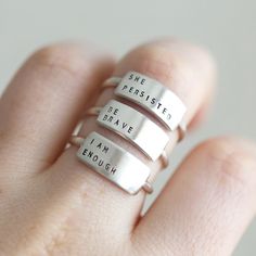 If you love the Enneagram like we do, this ring is calling your number! Let everyone know your enneagram number in style! Made exclusively for us by Christina Kober, each ring is sterling silver and hand stamped with your enneagram number. These make a great conversation starter! They also make a perfect gift for any fan of the enneagram. details custom stamped with your enneagram number message plate measures 5/8" wide x 1/4" tall contact us if you need a different size: available ring sizes 3 Cheap Everyday Hand Stamped Stackable Rings, Cheap Hand Stamped Stackable Round Rings, Cheap Silver Stackable Rings Hand Stamped, Cheap Adjustable 925 Stamped Rings, Cheap 925 Stamped Jewelry For Anniversary, Cheap Stamped 925 Jewelry For Anniversary, Engraved Ring Funny, Cheap Sentimental Rings For Gifts, Quote Rings