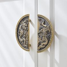 the door handle is decorated with gold and black designs