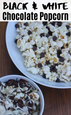 two white bowls filled with chocolate popcorn on top of a wooden table next to each other