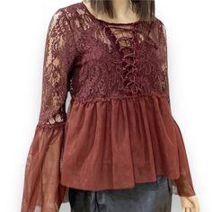 A Beautiful Brown Plunging V Neckline With Lace Up Long Semi Sheer Bell Sleeve, Empire Waist With Matching Cami Tank Peplum Trim Blouse By Taylor & Sage. A Great Style For Year Round Attire! Women’s Size Large Chest 36-38” Sleeve 24” Flared Sleeves 28" Length 23” Material: Nylon, Rayon Corset Tops Gorgeous Unique Coloring And Universal Staple For Formal To Casual Attire! A Bohemian To Souther Goth Style Top! Brown And Dark Red Hue Lace Up Neckline, Perfect Peplum Semi Sheer Long Tulip Sleeves Perfect Year Round Top! Fall V-neck Blouse With Lace Patchwork, Lace Patchwork Tops For Night Out In Fall, Chic Lace Patchwork Tops For Fall, Fall Party Tops With Lace Patchwork, V-neck Blouse With Lace Patchwork For Fall, V-neck Lace Patchwork Top For Fall, Fall Party Tops With Lace Trim, Feminine Fall Blouse With Lace Patchwork, Feminine Lace Patchwork Blouse For Fall