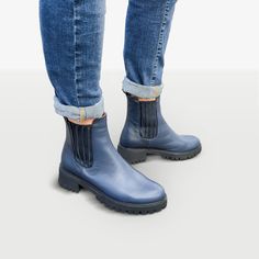 "This Chelsea boot offer an elegant combination of classic navy blue and edgy croc-embossed leather. It features elongated shaft, elasticated side panels and tractor sole. As a bonus, there is a pull tab at the back for an easy wear. Outer and inner material - leather, manmade sole, closure - slip on. Shaft height 14 cm / 5.5\", heel - 4.5 cm / 1.8\" --------Size Conversion & Feet Measurements------ EU 34 US 4.0 UK 1.0 | 22.5 cm / 8.85\" EU 35 US 5.0 UK 2.0 | 23.0 cm / 9.05\" EU 36 US 6.0 UK Navy Leather Boots For Outdoor, Blue Ankle-high Boots With Rubber Sole, Navy Round Toe Boots For Winter, Blue Winter Boots With Rubber Sole, Blue Ankle Boots With Rubber Sole, Blue Ankle-high Boots With Leather Sole, Blue Round Toe Boots With Vibram Sole, Winter Blue Boots With Rubber Sole, Blue Leather Moto Boots For Fall