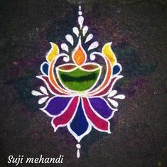 a colorful design on the ground with words written below it that says, diwali mehandi