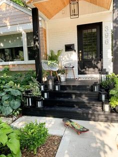 the front porch is decorated with plants and potted plants, along with a skateboard