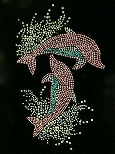 a black background with pink and blue designs on it's side, in the shape of two fish