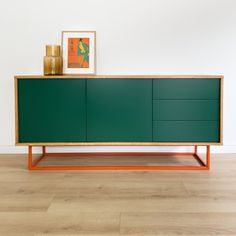 the sideboard is green and orange in color