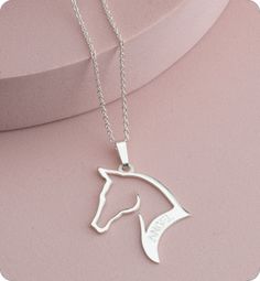 Elegant Horse Design Necklace As Gift, Elegant Necklace With Horse Design As A Gift, Silver Sterling Silver Jewelry For Shows, Horse Design Pendant Necklace As Gift, Horse Design Pendant Jewelry Gift, Horseshoe Shaped Engraved Jewelry Gift, Engraved Horseshoe Jewelry Gift, Engraved Horseshoe Jewelry For Gift, Elegant Round Jewelry With Horse Design