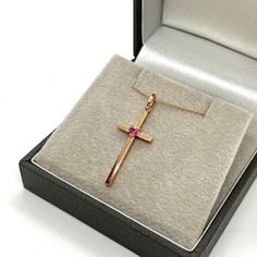 MELIGreece's 18k rose gold feminine cross-pendant with one 100% natural pink tourmaline in the center weighting 0.12 cts, set in a 18k rose gold chain. This solid gold heart-shaped tourmaline cross necklace as any necklace featuring a Christian cross are often worn as an indication of commitment to the Christian faith, and are sometimes received as gifts for rites such as baptism and confirmation. Adjustable length of the 18k gold chain at 42.0 cm / 16.5 inch. or at 39.0 cm / 15.3 inch. Dimensions of the cross pendant: 3.0 * 1.3 cm. / 1.18 * 0.51 inch. Pink tourmaline is a strong gemstone bringing emotional healing and self love. It helps its wearer to calm emotions in times of distress. This cross chain necklace is made with care in our workshop in the historic center of Athens in Greece. Rose Gold 14k Cross Necklace Gift, Rose Gold Cross Necklace As A Gift, Rose Gold Crucifix Necklace As Gift, Gift Rose Gold Crucifix Cross Necklace, Rose Gold Pendant Cross Necklace As Gift, 14k Rose Gold Cross Necklace, Cross Chain, 18k Gold Chain, Gold Cross Pendant