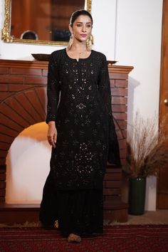 Black mukaish kurta with thread and mirror embroidery. Paired with coordinating gharara and chiffon dupatta. - Aza Fashions Black Sharara With Chikankari Embroidery For Diwali, Black Sharara With Chikankari Embroidery, Black Sharara With Chikankari Embroidery For Navratri, Festive Black Sharara With Mirror Work, Black Anarkali Sharara With Chikankari Embroidery, Black Palazzo Set With Mirror Work For Navratri, Semi-stitched Chanderi Sharara With Mirror Work, Traditional Black Palazzo Set With Chikankari Embroidery, Black Chikankari Embroidered Palazzo Set For Navratri