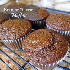 several muffins cooling on a wire rack with the words, bran or germ muffins