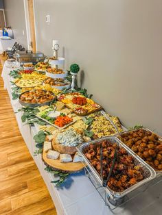 a buffet line with many different types of food