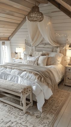 a white bed sitting in a bedroom next to a wooden dresser and lamp on top of a rug