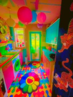 an image of a brightly lit kitchen with lots of decorations on the walls and floor