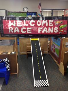 an indoor race track is set up for children to play