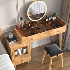 a dressing table with a mirror and stool