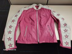 Medium size pink woman's leather motorcycle jacket with stars down the sleeves. Has a zip out liner. Like new, never worn outside of the house other than to try on. Pink Motorcycle Jacket, Diy Leather Jacket Ideas, Fitted Pink Biker Leather Jacket, Pink Winter Biker Jacket, Winter Pink Biker Jacket, Pink Punk Outfits, Motorcycle Outfits For Women, Diy Leather Jacket, Jacket With Stars