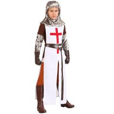 a little boy dressed in a knight costume with a cross on it's chest