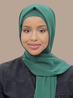 Our Luxury Chiffon Hijab-Forrest Green is perfect for every occasion. With the softest chiffon fabric we could find, our Luxury Chiffon will become your go to hijab whether you're going out to a fancy party or keeping it casual, looking beautiful is effortless! If you're looking for the perfect hijab and under scarf match for this color. We have paired it for you with our Premium Jersey Under scarf Forrest Green (Sold Separately) Fabric: Polyester Chiffon Dimension: 70" x 27" Contour: Long Recta