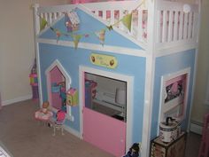 a child's bedroom with a doll house and bunk bed