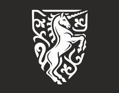 the unicorn logo is shown in white on a black background, with an ornate design