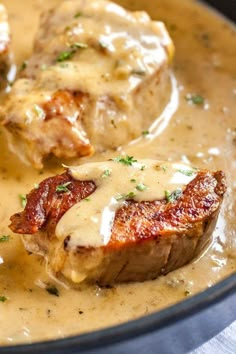 some meat with gravy in a skillet